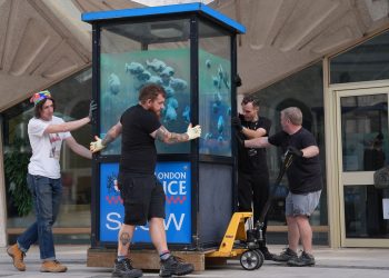 Banksy’s piranhas police box put in protective storage ahead of museum display | UK News