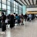 Day of delays after airport check-in system hit