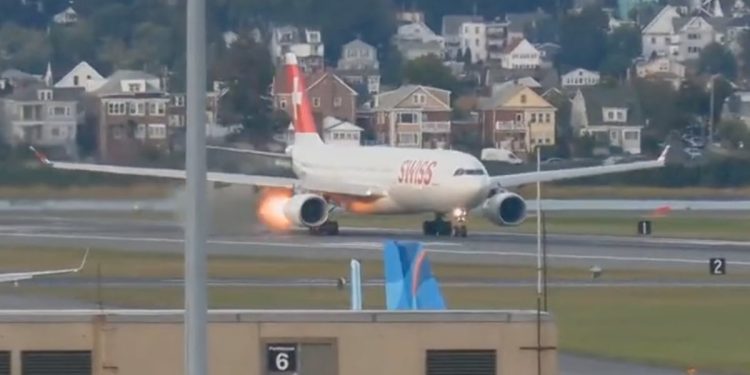 Flight departing from Boston puts on the brakes after spitting out flames