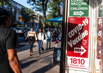 CDC panel votes to limit Covid vaccine eligibility for most healthy adults