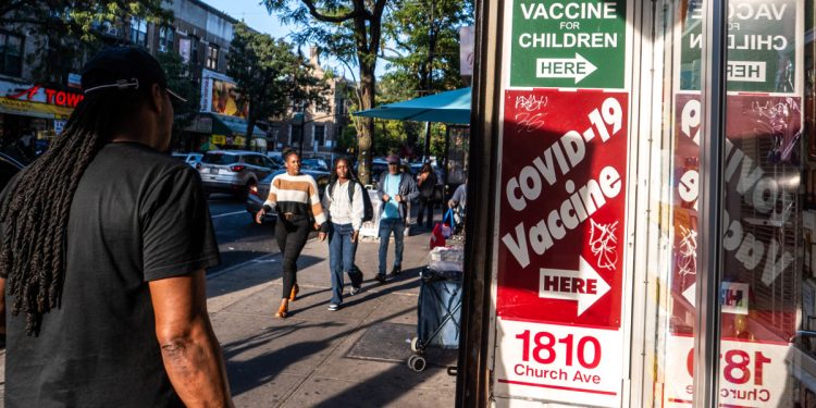 CDC panel votes to limit Covid vaccine eligibility for most healthy adults