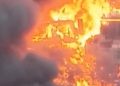 Drone footage shows massive fire engulfing Peru homes