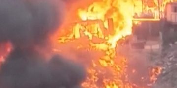 Drone footage shows massive fire engulfing Peru homes