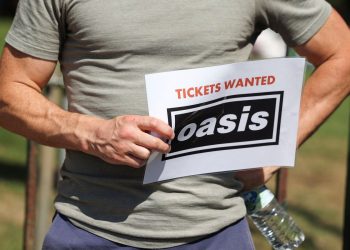 Woman charged with fraud over ‘sale of Oasis tickets’ | UK News