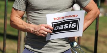 Woman charged with fraud over ‘sale of Oasis tickets’ | UK News