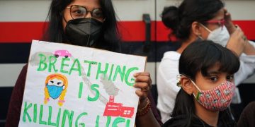 Air pollution in Indian capital Delhi closes schools, draws protests and a warning for the sick to escape