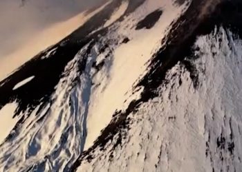 Aerial video captures eruption of snowy Mount Etna