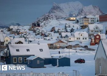 Trump threatens new tariffs on countries opposed to Greenland takeover as US lawmakers visit Denmark to ease tensions