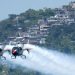 Spanish Air Force helicopter show amazes Rio beachgoers