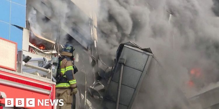 Thick smoke billows from South Korea car parts plant in deadly fire