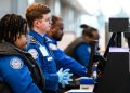 Long security lines form at airports as TSA agents miss first full paychecks amid DHS standoff