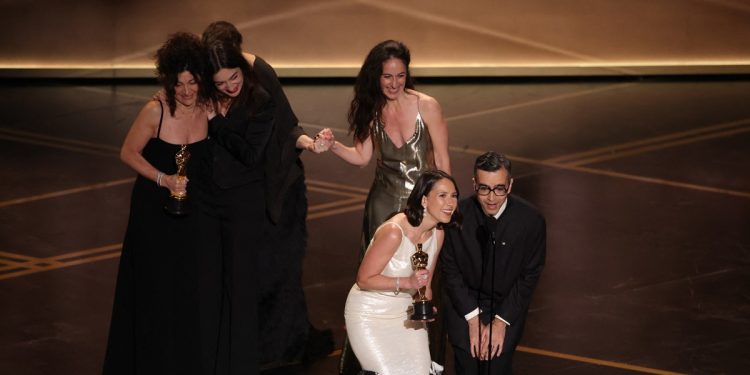 Rare Oscars tie goes to best live-action short film winners ‘The Singers,’ ‘Two People Exchanging Saliva’