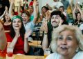 Iran diaspora watches World Cup game with protests, support