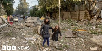 Massive Russian attack on cities across Ukraine kills at least 14 people