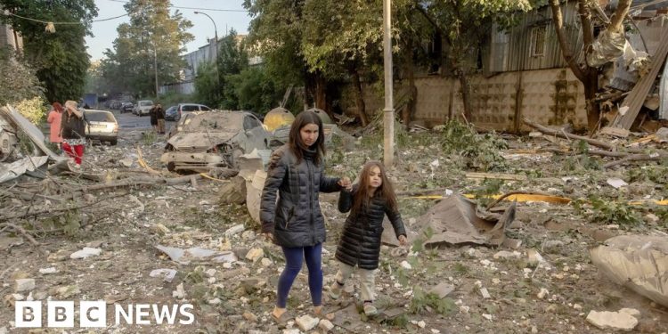 Massive Russian attack on cities across Ukraine kills at least 14 people