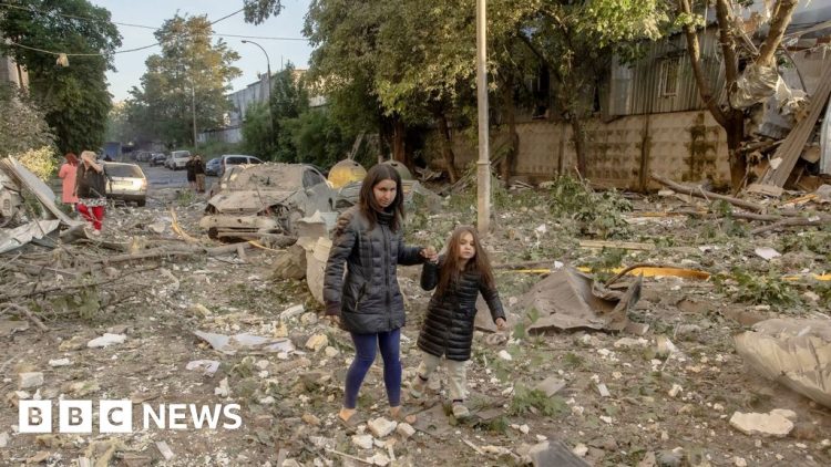 Massive Russian attack on cities across Ukraine kills at least 14 people