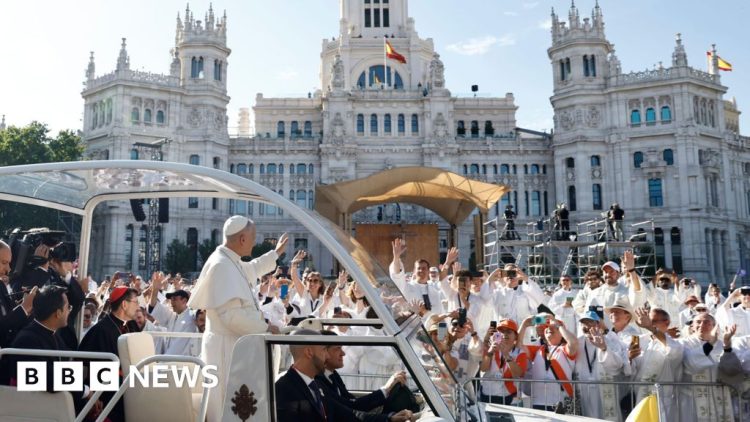 Huge crowds throng Madrid streets for Pope's open-air mass