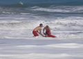 Dramatic video shows a 10-year-old boy rescued from pounding waves