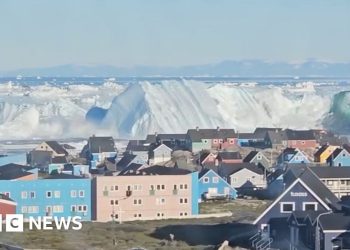 Giant iceberg turns over near Greenland’s coast