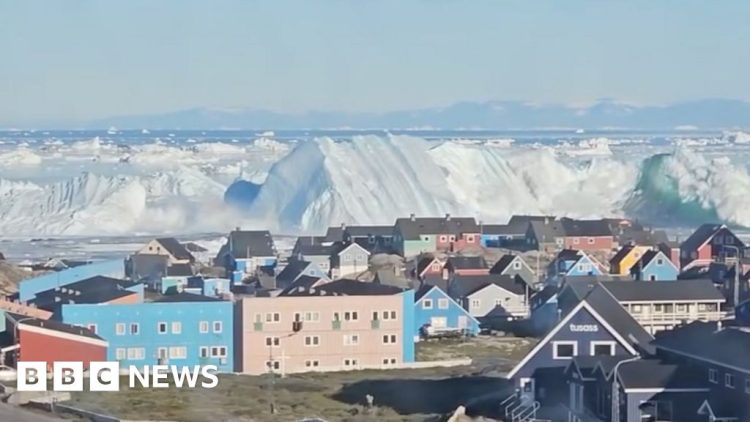 Giant iceberg turns over near Greenland’s coast