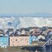 Giant iceberg turns over near Greenland’s coast