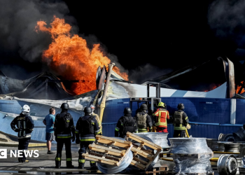 At least 37 dead and hundreds evacuated after strike on Kyiv warehouse