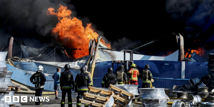 At least 37 dead and hundreds evacuated after strike on Kyiv warehouse