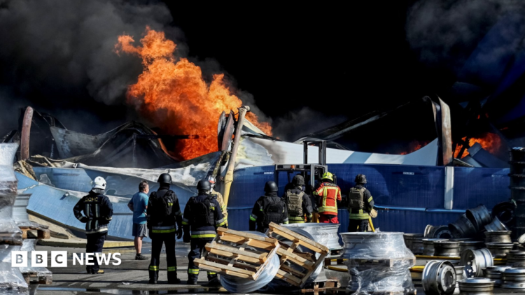 At least 37 dead and hundreds evacuated after strike on Kyiv warehouse