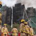 Hong Kong leader apologizes for deadly fire that tested Beijing’s grip on city