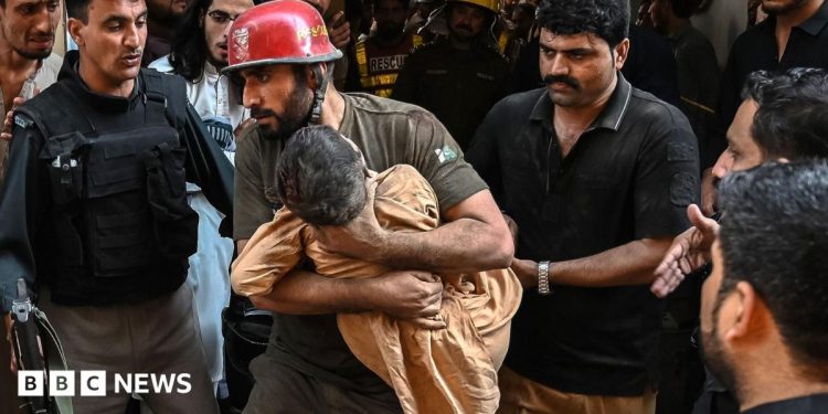 At least 27 pupils and teacher killed after Pakistan school roof collapses